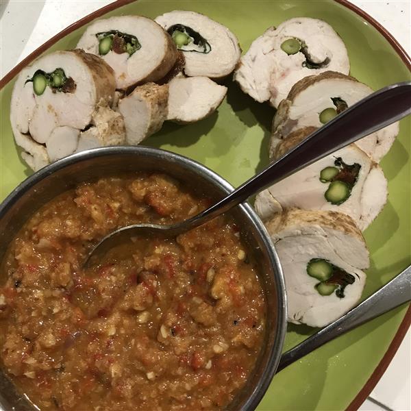 Poached rolled chicken breast with romesco sauce
