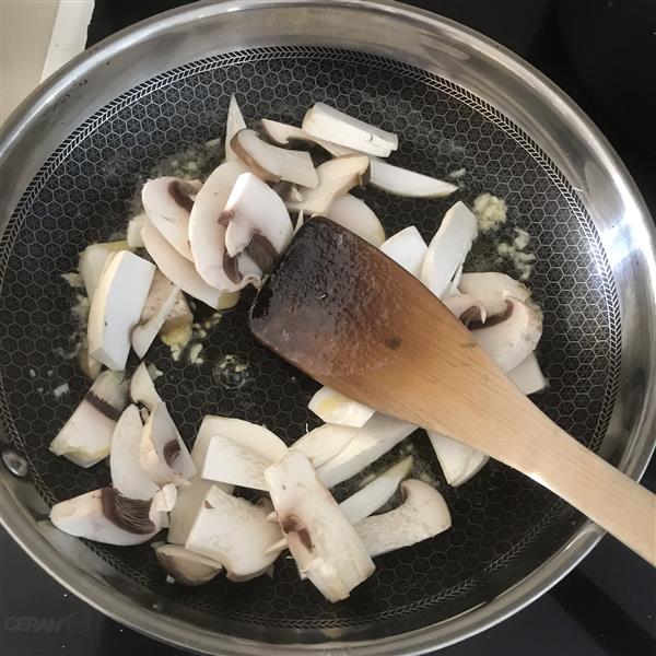 Add mushrooms to pan