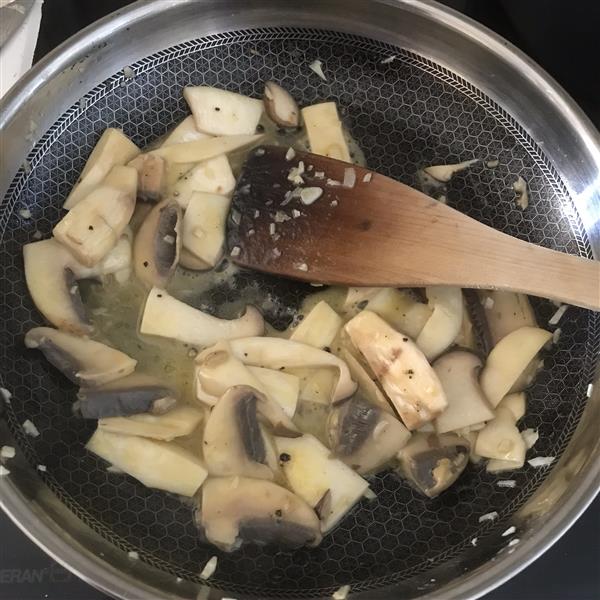 Toss mushrooms with garlic butter